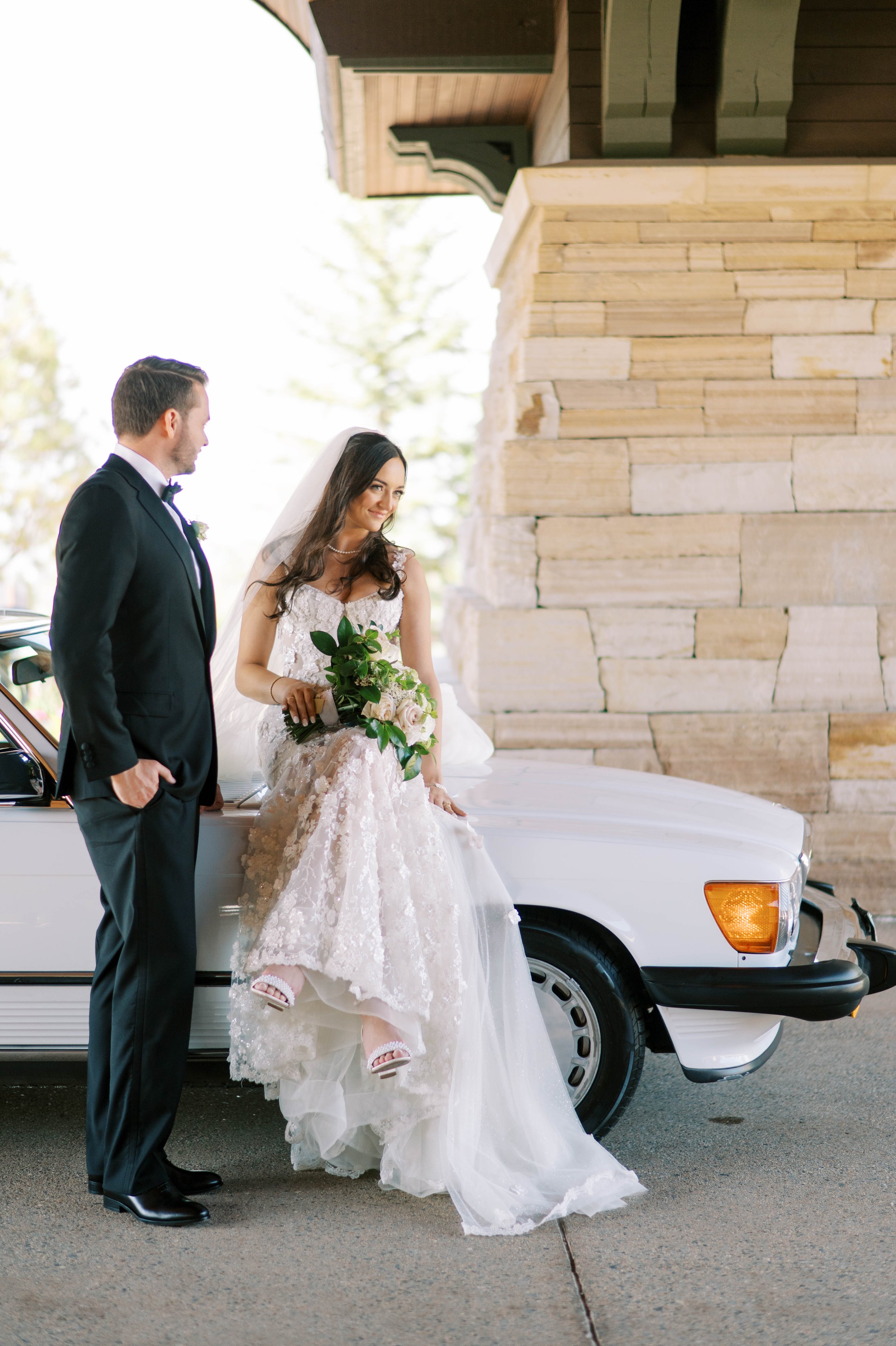 Newlyweds and a vintage-car send-off